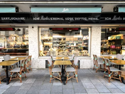 Heatscope Vision 3200W Radiant Heater provides discreet ceiling-mounted infrared warmth for an indoor restaurant dining space.